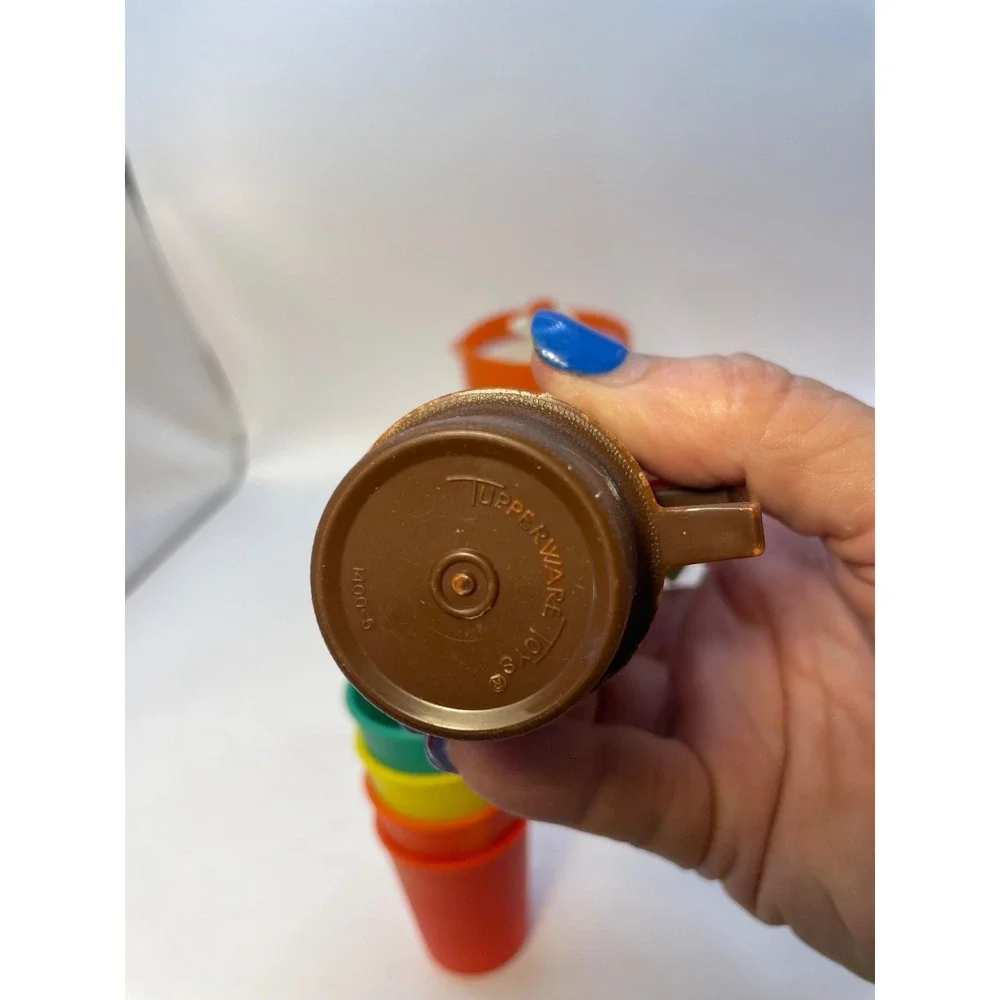 1970 vintage Tupperware  Toys  10 Piece;Orange pitcher with lid 4 cups 4 glasses